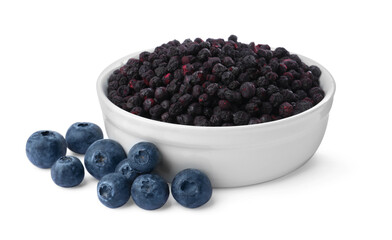 Sweet sublimated and fresh blueberries on white background