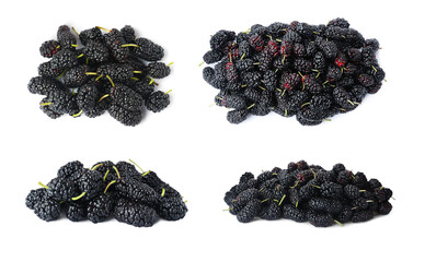 Set with fresh ripe black mulberries on white background