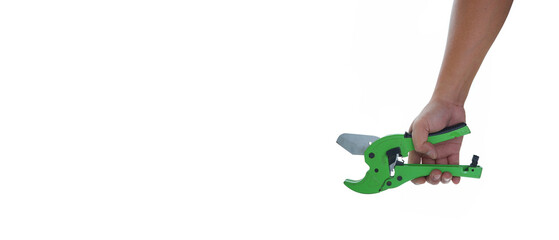 Hand holding green plastic pipe cutter isolated white background with copy space