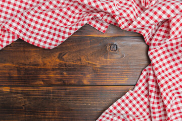 Fabric red and white cover on the table. Flat lay, top view. Background of menu for the restaurant,...