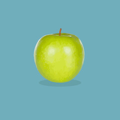 Grüner Apfel auf blauen Hintergrund.
