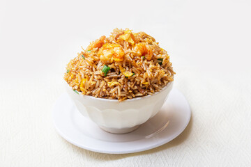 Combination of Peruvian style chaufa, chicken, pork and vegetables