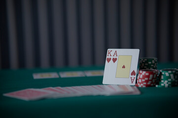 the poker game in casino chips cards and the poker table, winning combination in poker