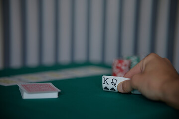 the poker game in casino chips cards and the poker table, winning combination in poker