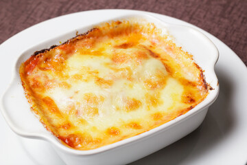 Traditional italian lasagna with vegetables, minced meat and cheese.  - Imagen