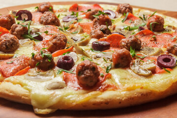 Delicious pizza served on wooden plate  - Imagen