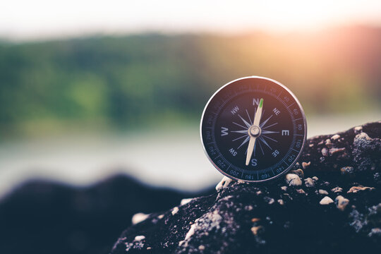 Travel of tourists with compass. compass of tourists on mountain.