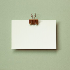 Blank memo pad on green background. copy space