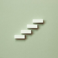 Abstract stairs or steps concept on green background