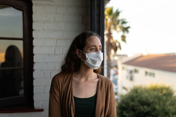 Caucasian woman spending time at home self isolating and social distancing in quarantine lockdown du