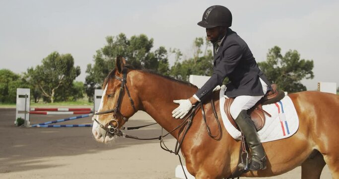 African American man riding his Dressage horse