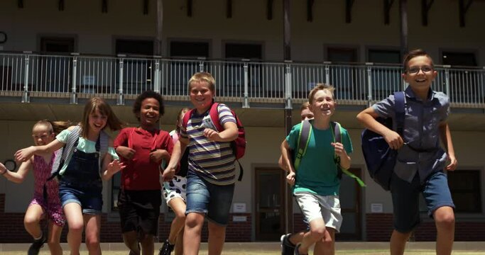 Group of kids running in the school