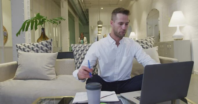 Businessman working on computer in modern office