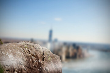Large rock overlooking foggy city