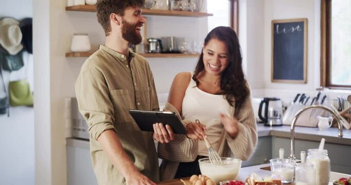 Couple, cooking or baking from tablet recipe for health meal, cake or dessert in home kitchen. Smile, happy or comic man and woman bonding, in love and laughing with brunch or breakfast food in house