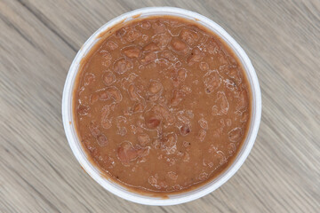 Overhead view of Mexican food needs a side order of authentic refried beans to complete the flavor of the meal