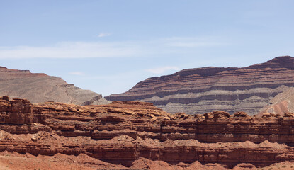 American Landscape in the Desert with Red Rock Mountain Formations. Mexican Hat, Utah, United States of America.