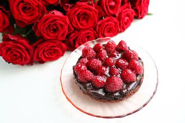 berry dessert. chocolate cheesecake with raspberries and jelly