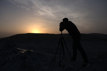 Photographing the sunset on the mountains