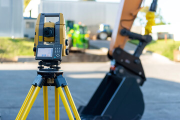 Robotic total station in action with excavator