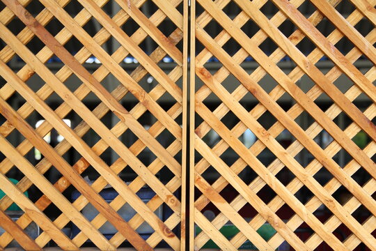 Wooden grid, the background of woven wood 