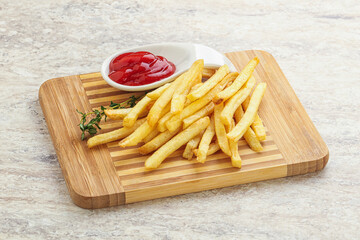 French fried potato over board