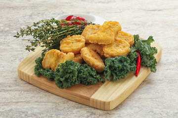 Crispy chicken nuggets with tomato ketchup