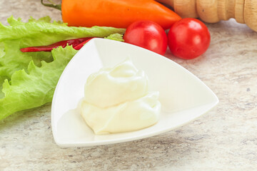 Organic mayonnaise sauce in the bowl