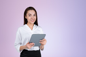 Fototapeta premium Smiling businesswoman wearing formal wear is standing holding ta