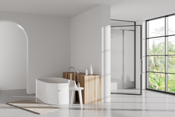 Light bathroom interior with tub and douche, panoramic window. Mockup wall