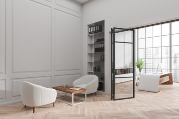 Stylish office interior with work and chill area, panoramic window