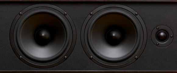 Black speaker system speakers close-up. Wide format for a banner, macro shot
