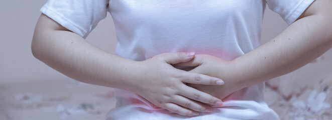 woman is having stomach ache,health concept.