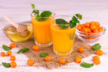 Sea buckthorn juice with honey and mint.
