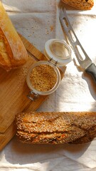 bread with sesame seeds and knife