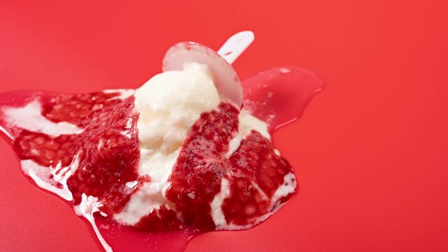 red lychee shape and flavor popsice melting timelapse on red background