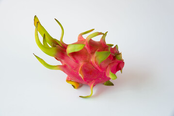 Fresh dragon fruit on white background.