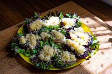 dish with lettuce and fried onions 