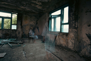 Fototapeta na wymiar Scary ghost woman in haunted house