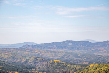 Obraz premium Beautiful view from the Sudovaya mountain to Inzer rocks, Yamantau mountain, Iremel mountain. Russia, South Ural, Bashkortostan Republic, Beloretsky district, near the Tirlyansky village.