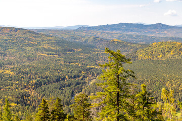 Beautiful view from the Sudovaya mountain to Inzer rocks, Yamantau mountain, Iremel mountain. Russia, South Ural, Bashkortostan Republic, Beloretsky district, near the Tirlyansky village.