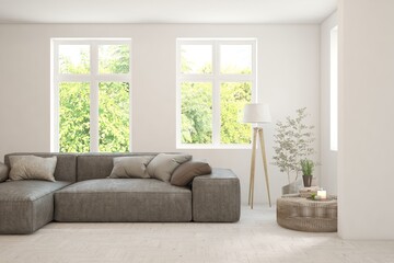 Minimalist living room in white color with sofa and summer landscape in window. Scandinavian interior design. 3D illustration