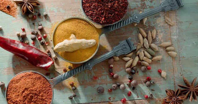 Wooden table of colorful spices.