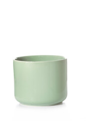 Green porcelain cup without handle isolated on white background.