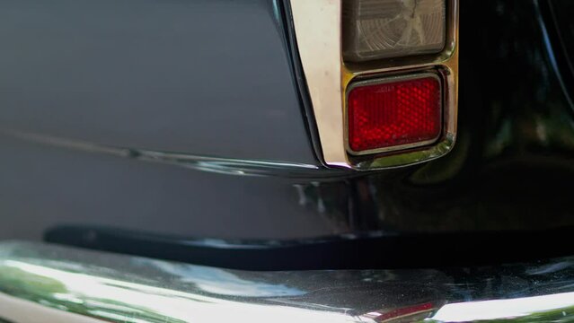 Old american car headlights or taillight muscle car, close up. Vintage pop shot