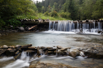 Fototapeta premium a river in the mountains