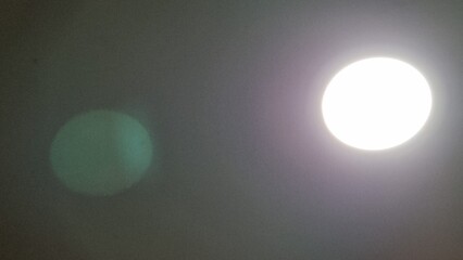 Abstract background, large lights attached to cement ceiling, computerized illustration, filter and gradient, purple black gradient blur, white background, texture, moon, light, sky, night, halloween,