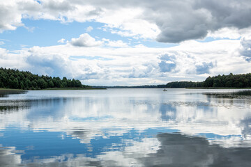 Peaceful scenery on a partly sunny day at the lake Lielezers in Limbaži in September in Latvia