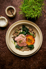 Pork tenderloin with mushrooms, squash & kavolo Nero
