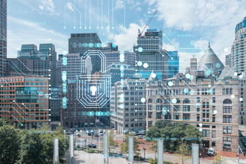 Financial downtown city view panorama of Boston from Harbour area at day time, Massachusetts. Glowing Padlock hologram. The concept of cyber security to protect companies confidential information